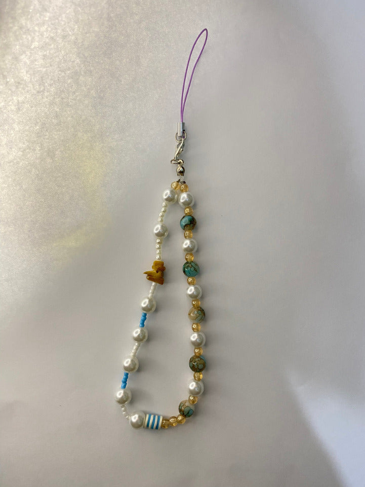 Striped accent bead detail on boho phone charm strap