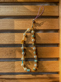 Handmade turquoise and pearl beaded phone charm with silver clasp